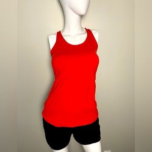 Lululemon Cool Razorback tank size 6/8 in a bright, vibrant orange